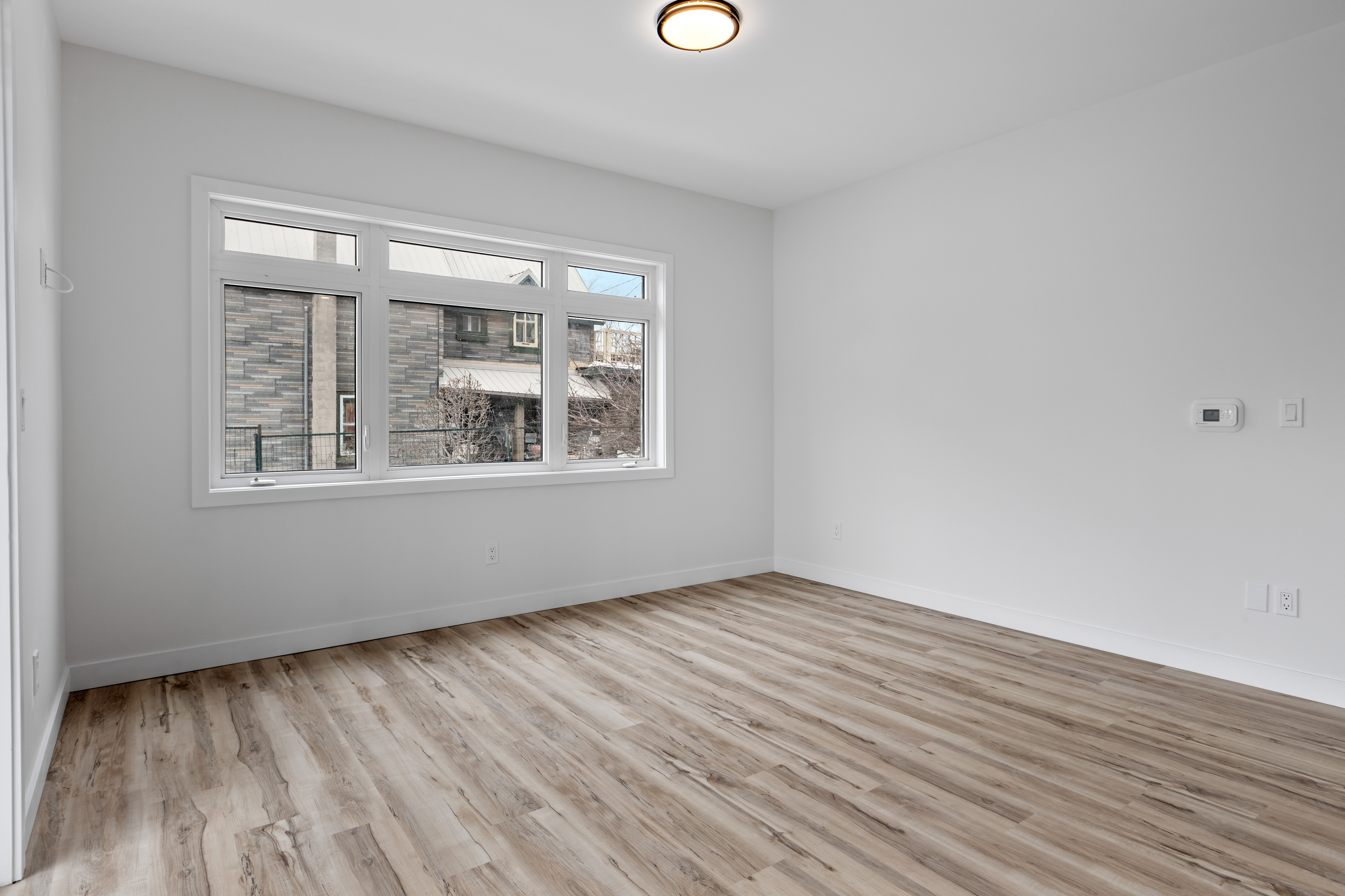 Original listing photo of an empty living room