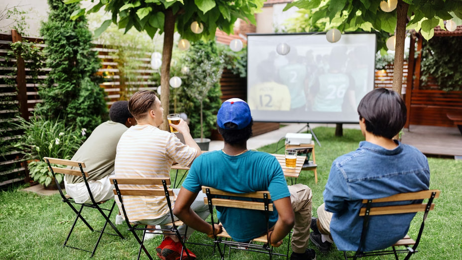 Backyard outdoor theater set up for a World Cup watch party